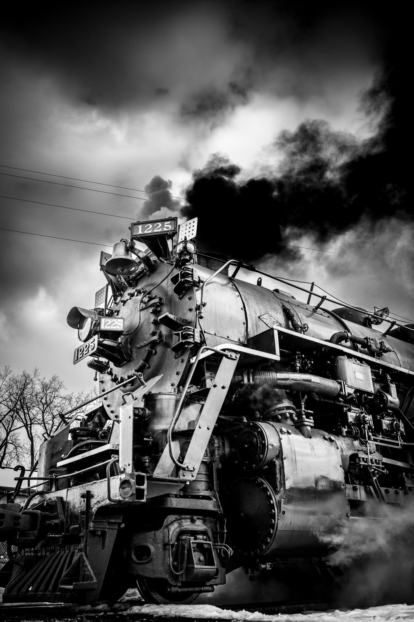 Black and white photograph of steam locomotive 1225